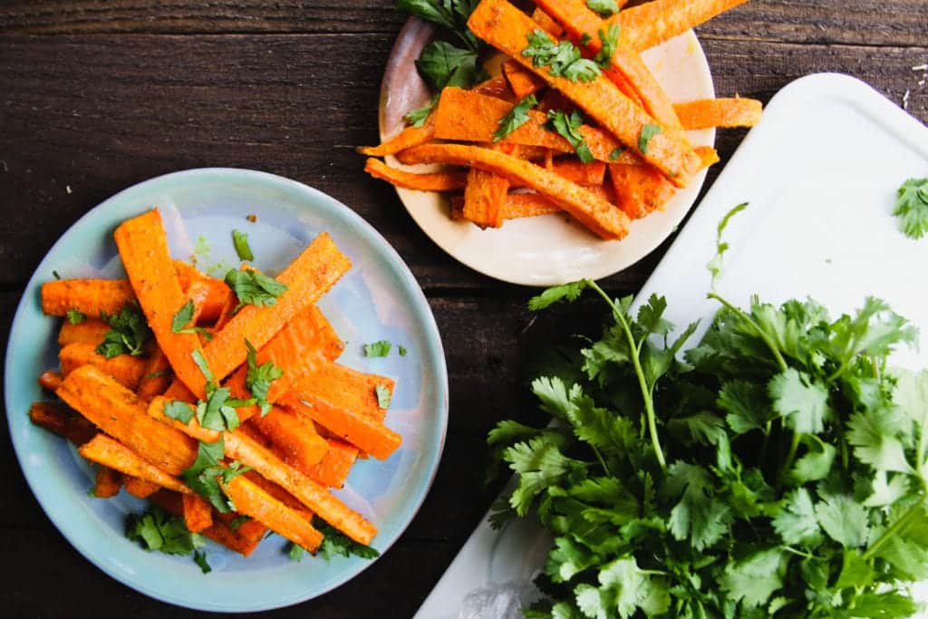 curried carrot fries on plate