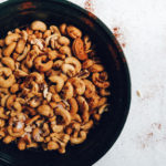 chili roasted cashews in black dish