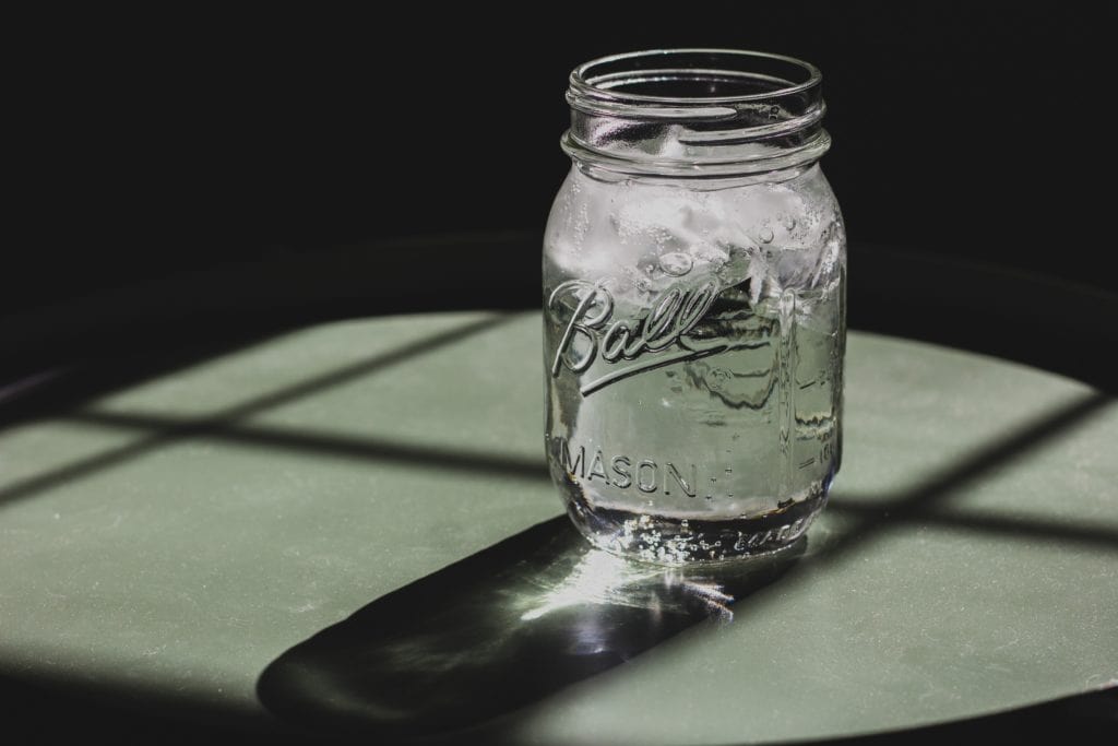 mason jar with water on table