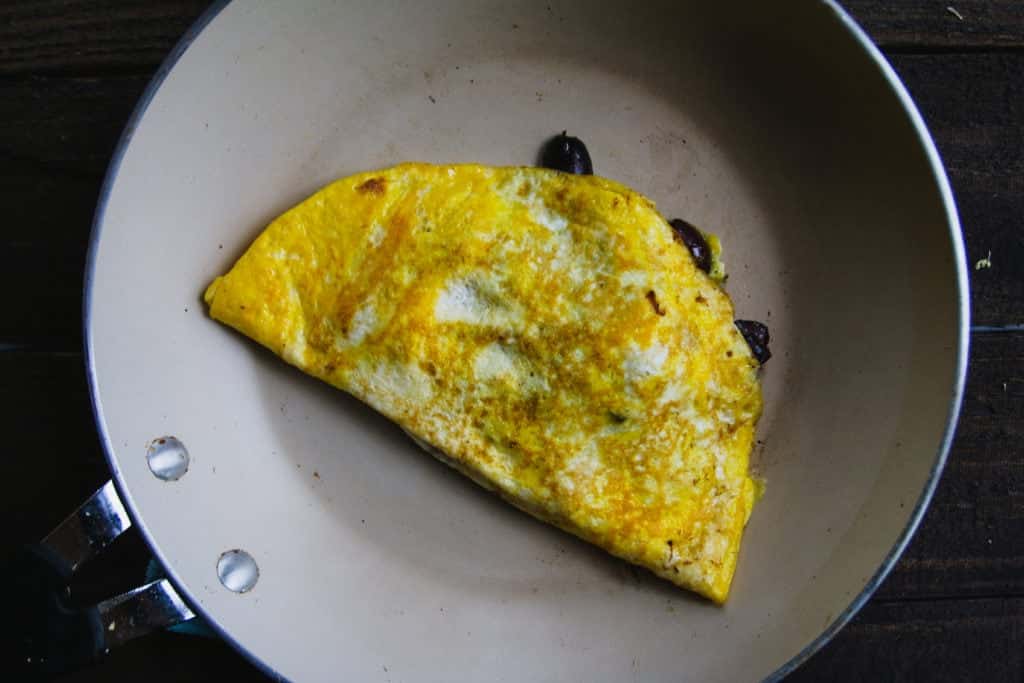 cooked omelet in skillet