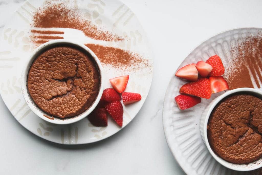 chocolate souffle in ramekins with strawberries