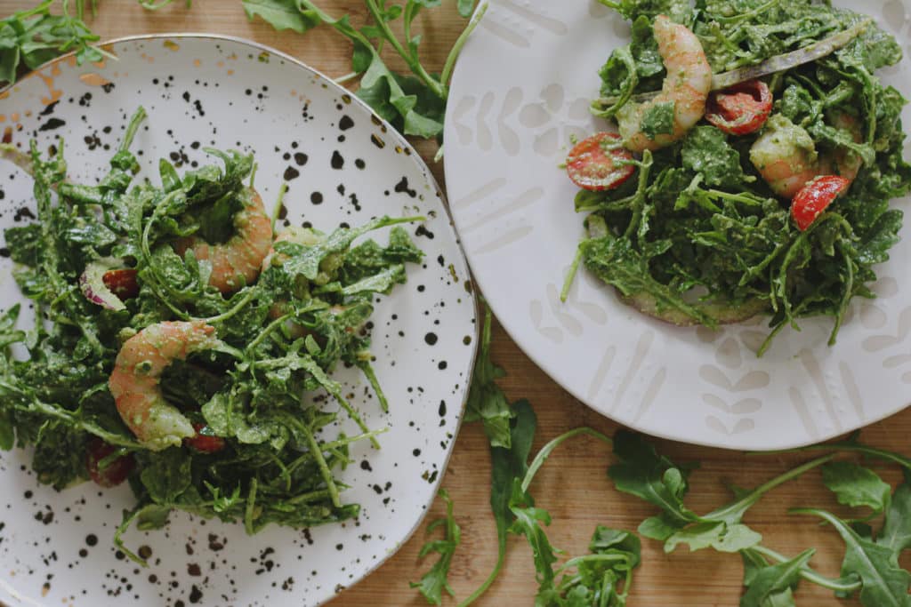 pesto shrimp salad on two plates