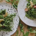 pesto shrimp salad on plates