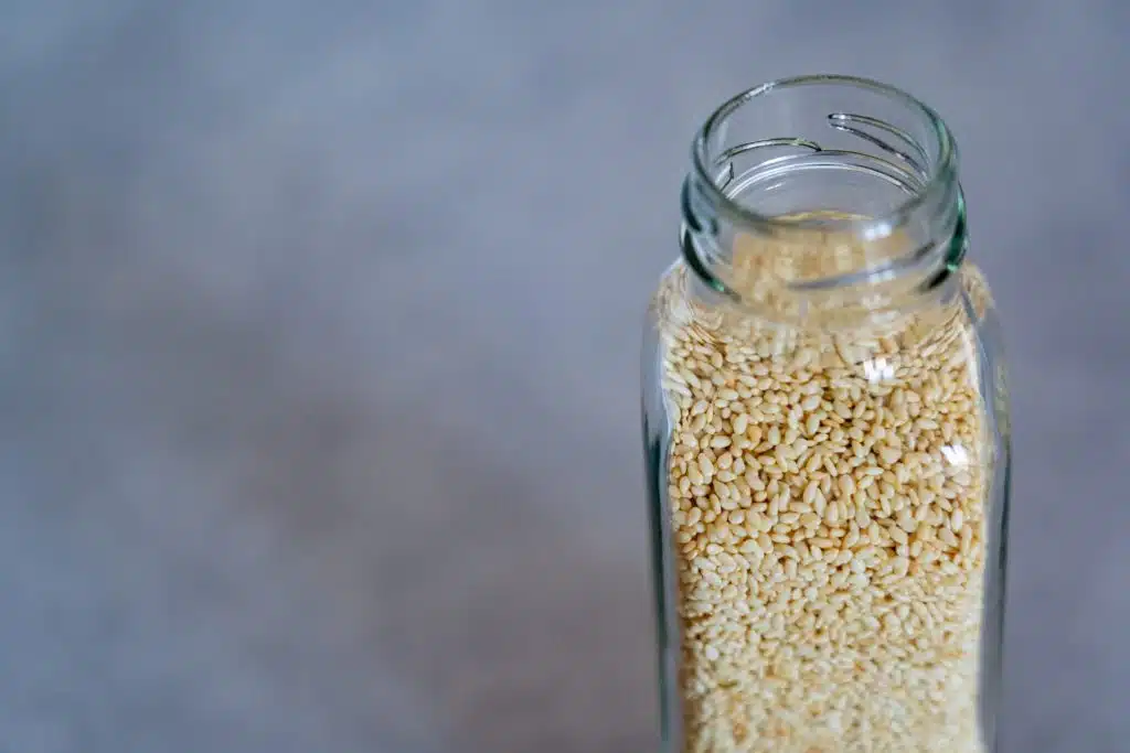 sesame seeds in glass jar