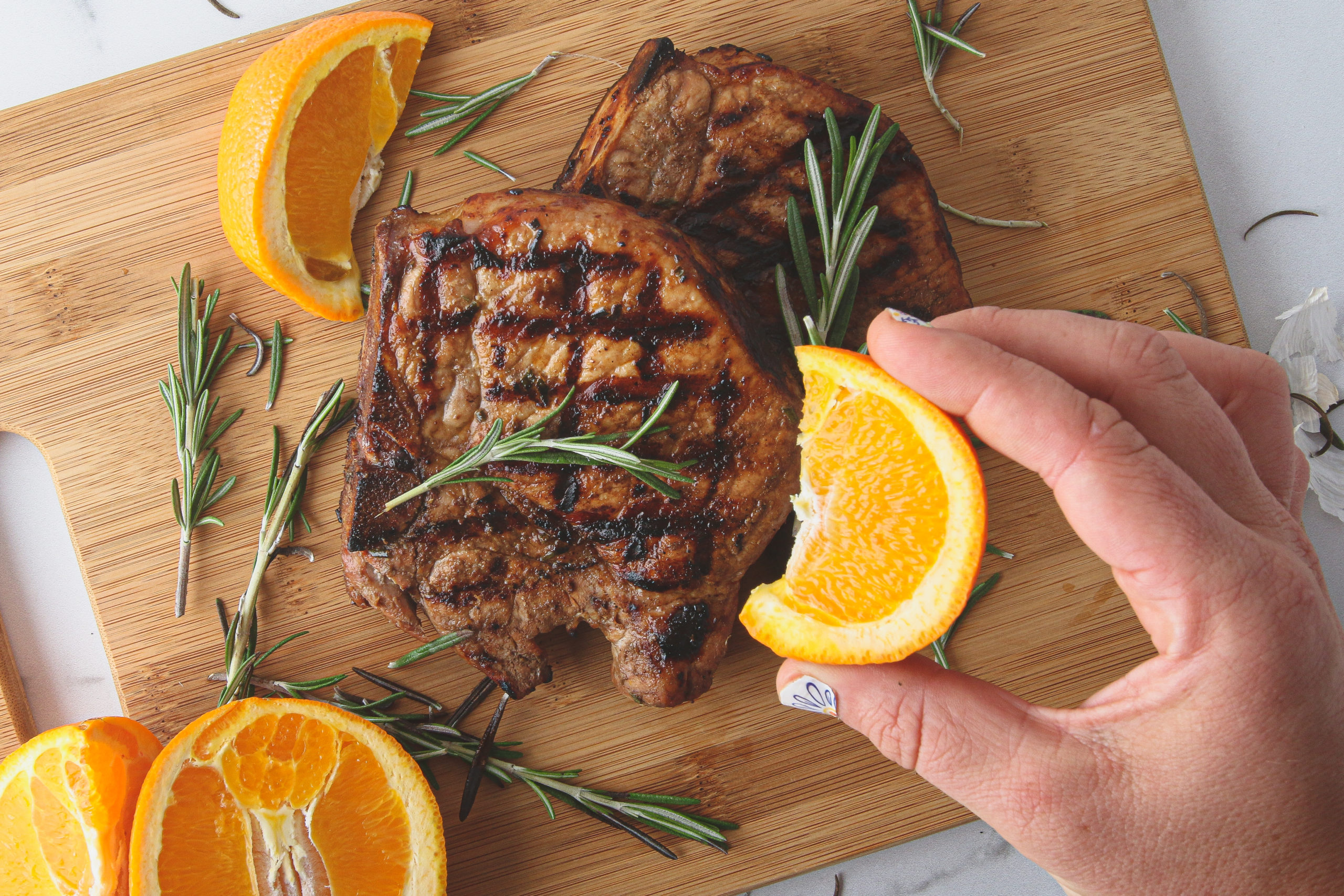 grilled pork chop with rosemary and orange