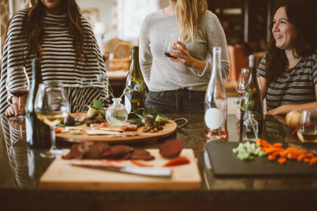 women with wine and food