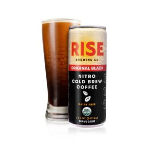 a can and a glass of rise brewing co. nitro cold brew coffee 