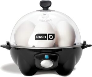 dash egg cooker with a black base and clear lid